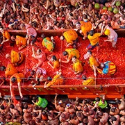Participate in La Tomatina Festival in Spain