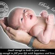 Hold a Newborn Baby in Your Arms