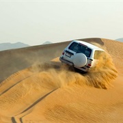 Thunder Through the Sand Dunes Outside Abu Dhabi on a Desert Safari