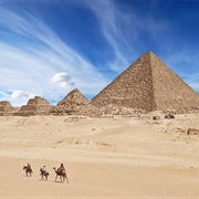 See the Great Pyramids of Giza (Only Ancient Wonder Still in Existence)