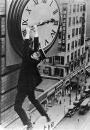 Harold Lloyd Hanging From the Clock in Safety Last (1923)