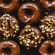 Chocolate Iced and Cookie Dough-Filled Pumpkin Donut With Peanuts (Gourdberry Batch)