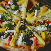 Vegan Olive Bell Pepper and Baby Corn Pizza