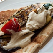 Roasted Eggplant, Red Onion, and Sour Cherry Naan Sandwich