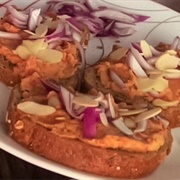 Sundried Tomato Hummus, Red Onion, and Almond Open-Faced Sandwich