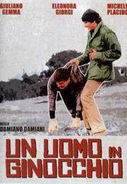 Un Uomo in Ginocchio