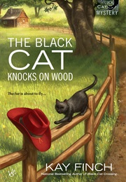 The Black Cat Knocks on Wood (Kay Finch)