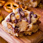 Peanut Butter Cup Pretzel Cheesecake Bars
