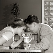 Share a Milkshake at a Restaurant