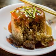 Tube Rice Pudding (筒仔米糕)  Sticky Rice and Chinese Mushrooms Are Fried