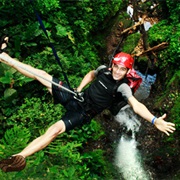 Rappelling Down a Waterfall