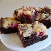 Raspberry Salted Caramel Cheesecake Brownies