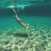 Go Skinny-Dipping at Paradise Beach in Greece