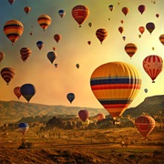 See Hot Air Balloons at Sunrise at Goreme Sunset Point in Turkey