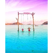 Swing in Tanjung Aan Beach in Indonesia