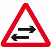 Two Way Traffic Crosses One Way Road