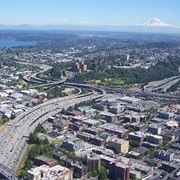 View on Ice-Capped Mt Rainier Behind the Skyline of Seattle, USA