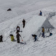 Build a Jump Out of Snow and Try It Out on Your Sled