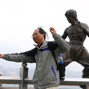 Doing Bruce Lee's Karate Pose in Hong Kong