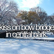 Kiss on Bow Bridge in Central Park