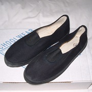 Gutties = Plimsoles or Cheap Trainers