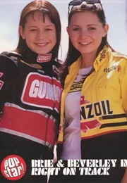Beverley Mitchell and Brie Larson in Right on Track (2003)
