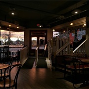 People Watch From a Local Cafe