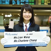 Hold a Sign With a Friend's Name in the Airport Lobby