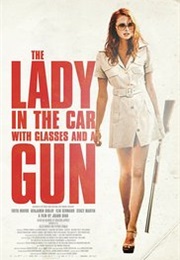 La Dame Dans L'auto Avec Des Lunettes Et Un Fusil (2015)