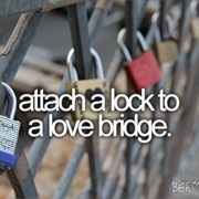 Attach a Lock to a Love Bridge