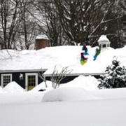 Sled off House Roof