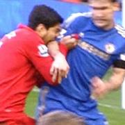 Lluis Suarez Biting