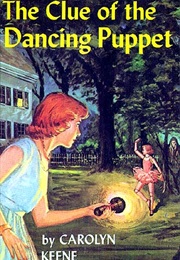 The Clue of the Dancing Puppet (Carolyn Keene)