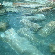 Swim in Ancient Greek Bath Among Ruins