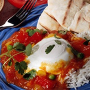 Poached Egg in Red Sauce