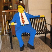 Man on Bench Made of Lego Bricks