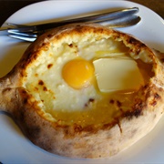 Eating Ajaruli Khachapuri, Georgia