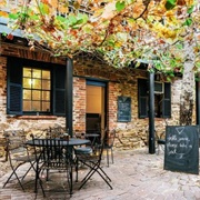 Read a Book Outside at a Cafe