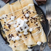 Fully Loaded Crepe-1 Large Crepe,3Tbsp Nutella,3Tbsp Biscuit,1Cup Mallows,6Ferrero Rocher,Choco Syrp