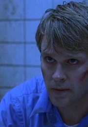 Dr Lawrence Gordon – Saw (2004)