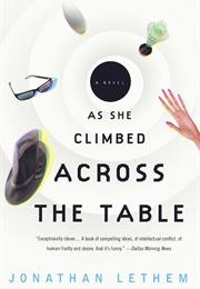 As She Climbed Across the Table