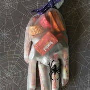 Fill Clear Plastic Gloves With Candy and Treats