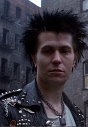 Gary Oldman, Courtney Love, and Chloe Webb in Sid and Nancy (1986)