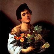 Boy With a Basket of Fruit