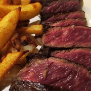 Have Steak Frites at Au Boeuf Couronné.