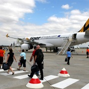 Board Plane via the Field