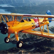 Enjoy the Scenery From a Biplane or Helicopter