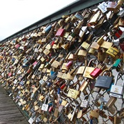 Add Lock to Love Lock Bridge in Paris
