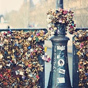 Put a Love Lock on Pont Des Arts Bridge in Paris