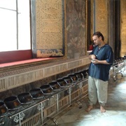 Given Alms at a Temple